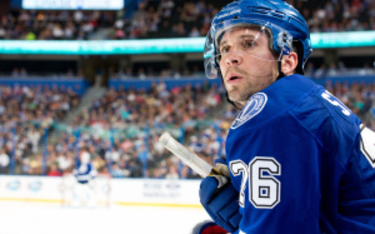 Tampa Bay Lighting Captain Marty St. Louis may miss Thursday's game vs. the Minnesota Wild after he was seen in a walking boot because of an injury sustained during Tuesday's win over the Los Angeles Kings. (Scott Audette/Getty Images)