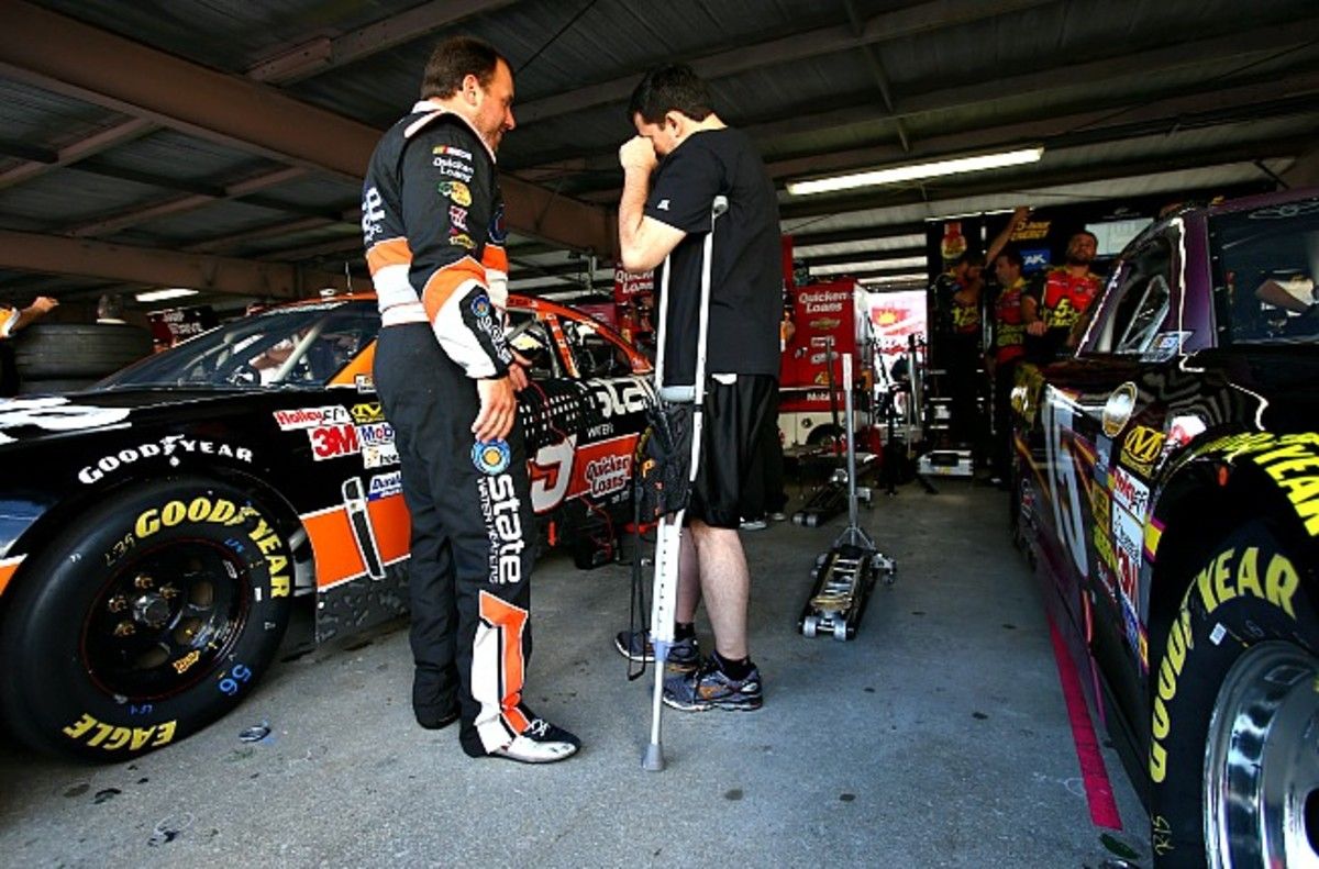 Tony Stewart (right) hopes to be back behind the wheel in time for the Daytona 500.