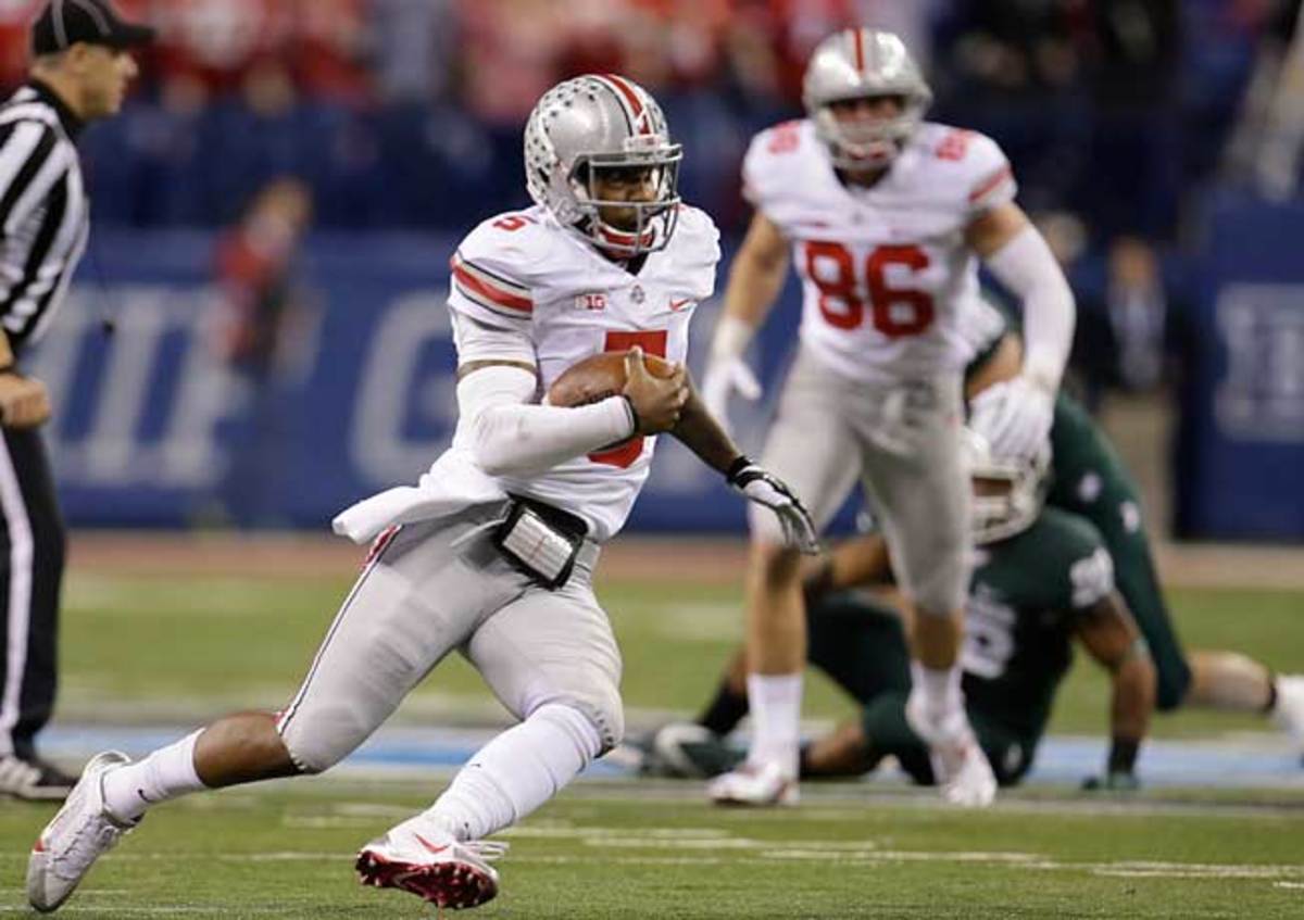 Ohio State QB Braxton Miller (5) ran for 1,033 yards and 10 TDs in 2013. (AP Photo/AJ Mast)