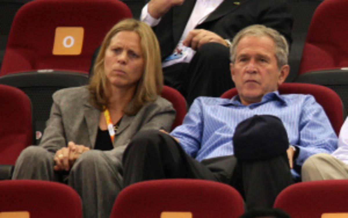 Big East Commissioner Val Ackerman pictured here with former U.S. President George W. Bush at a preliminary basketball game between the United States and Czech Republic at the 2008 Beijing Olympics.