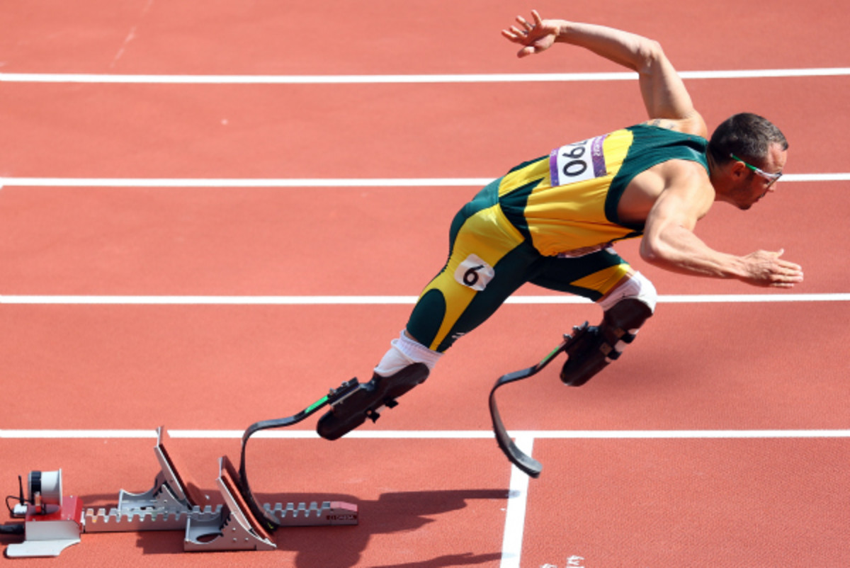 Oscar Pistorius, the first double-amputee to compete in an Olympics, was left off the South African Paralympic team. (Paul Gilham/Getty Images)