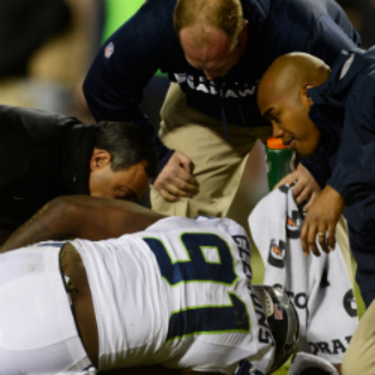 Chris Clemons tore his ACL in the Seahawks' win over the Redskins on Sunday and will miss the rest of Seattle's playoff run. (Patrick McDermott/Getty Images)