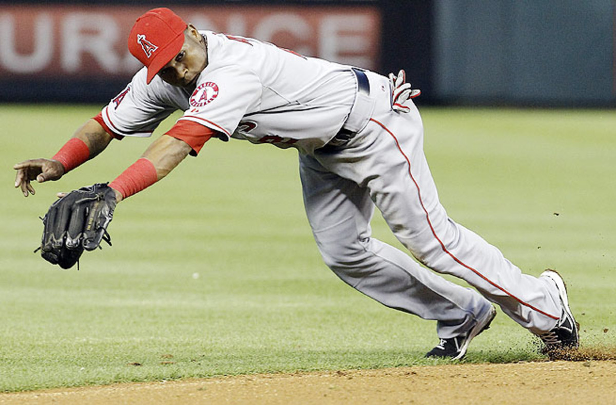 Erick Aybar tried to stay in the game after jamming his left foot on first base, but eventually had to come out. 