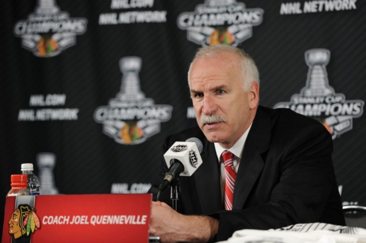 Blackhawks coach Joel Quenneville will coach the team through the 2016-17 season. (Harry How/Getty Images)