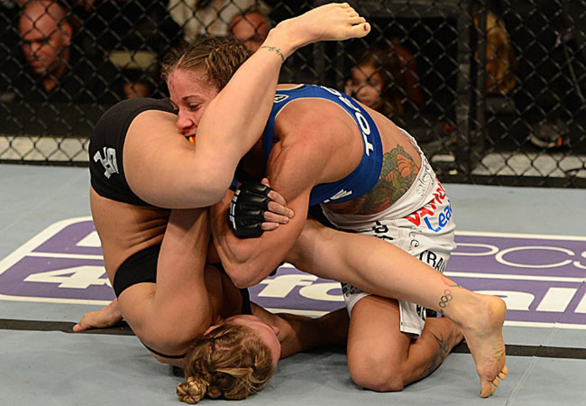 Liz Carmouche lost to Ronda Rousey via armbar with 11 seconds left in the first round of the first UFC female fight in history.