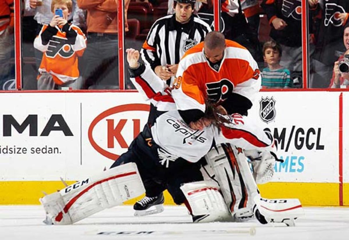 Ray Emery and Braden Holtby in a goalie fight.