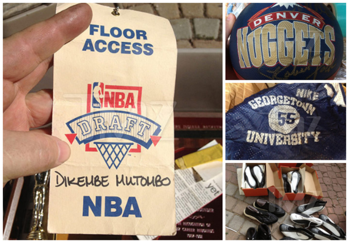 A storage unit auction winner stumbled into a trove of Dikembe Mutombo memorabilia. (Photos from TMZ.com)
