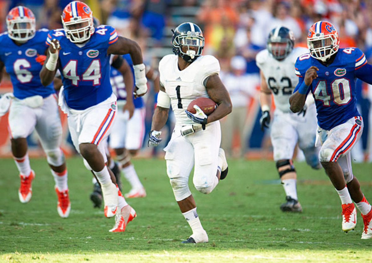 Jerick McKinnon (1) and Georgia Southern racked up 429 rushing yards in Saturday's upset of Florida.