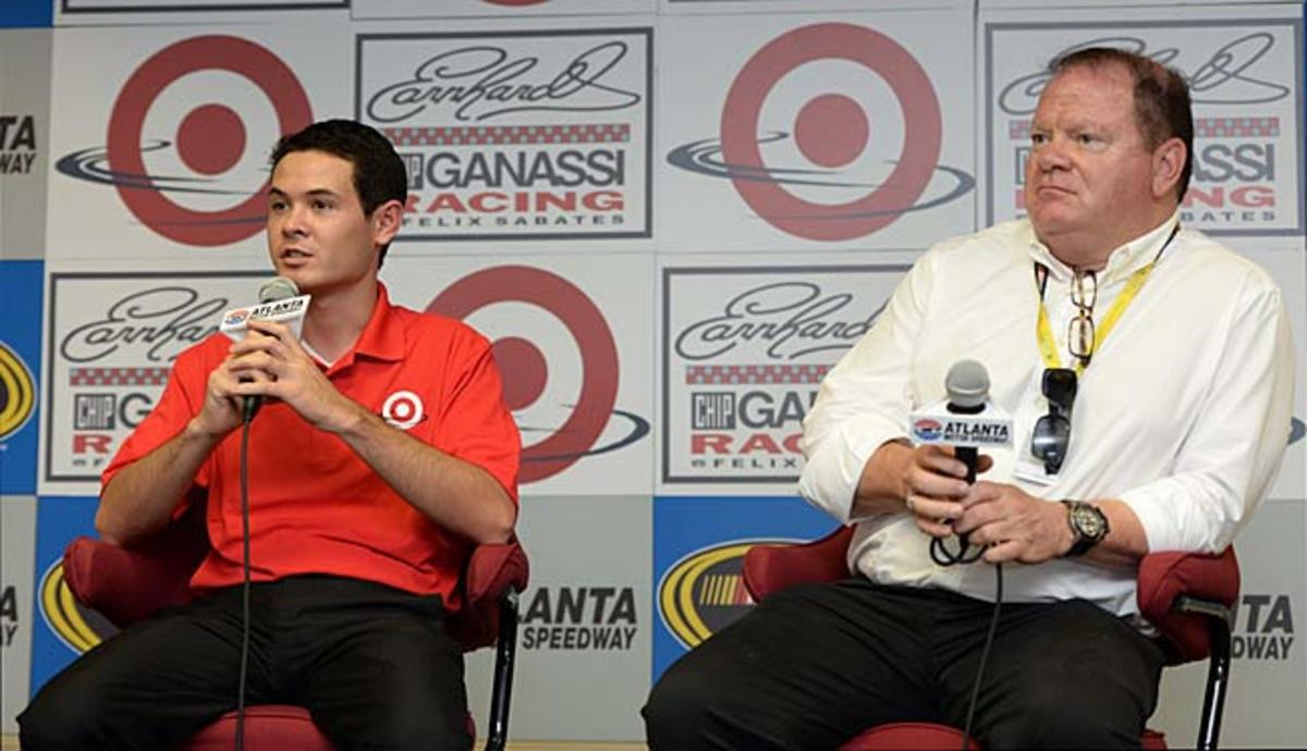 Host Chip Ganassi (right) will promote driver Kyle Larson to his Sprint Cup team next year.