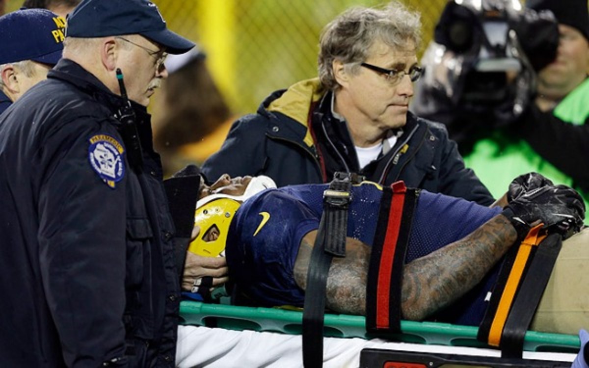 Packers tight end Jermichael Finley was carted off the field after suffering a neck injury. (Tom Lynn/AP Photo)