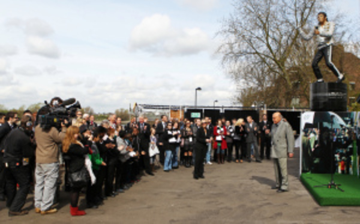 A nearly eight-foot statue of Michael Jackson that has stood outside Fulham F.C.'s stadium for almost three years was taken down on Wednesday. (Ian Walton/Getty Images)