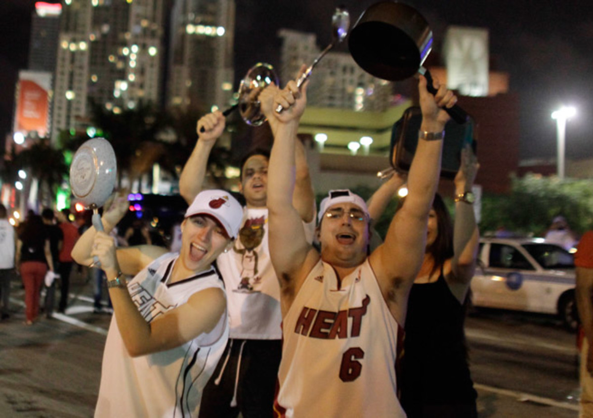 Miami Heat fans celebrated in the streets after their team beat San Antonio in Game 7 of the NBA Finals.
