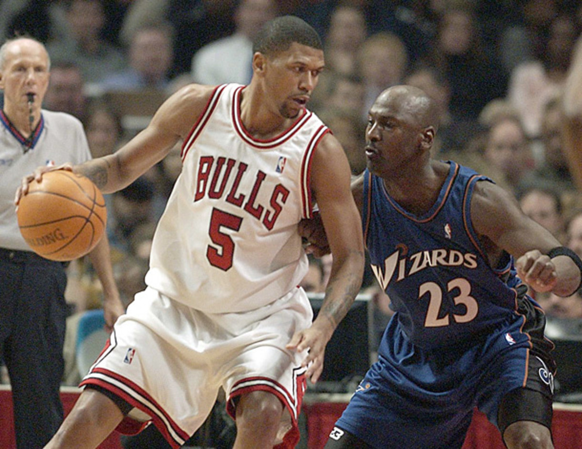 Rose posts up Michael Jordan. (AP)