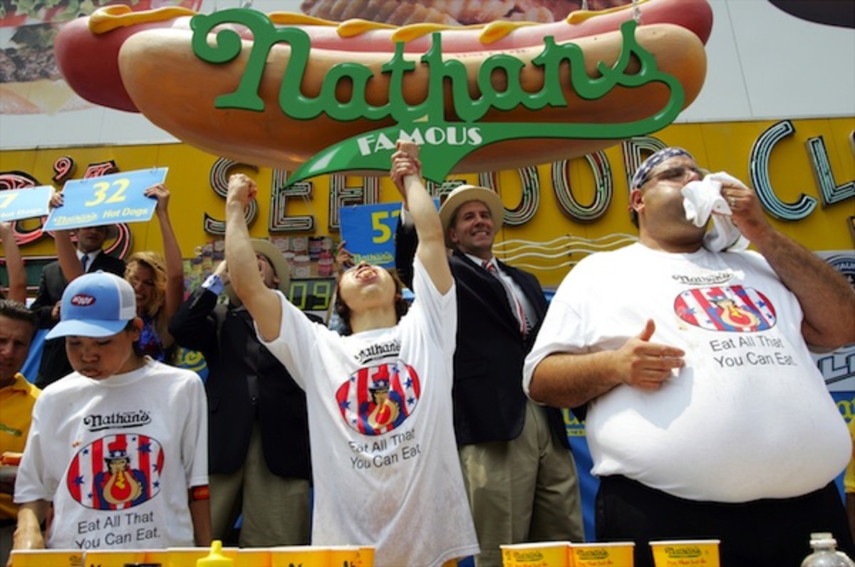 Defending champ Takeru (Tsunami) Kobayashi (center) still ha