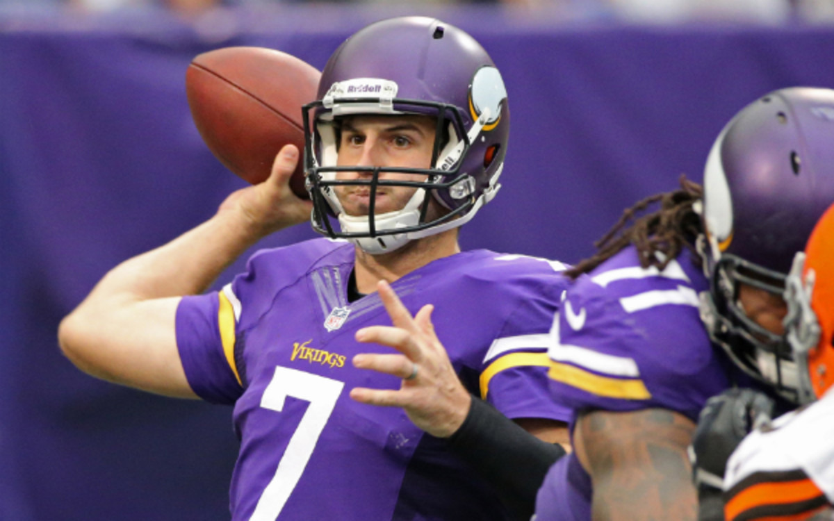 Christian Ponder is not happy with the Vikings' quarterback situation. (Tom Dahlin/Getty Images)