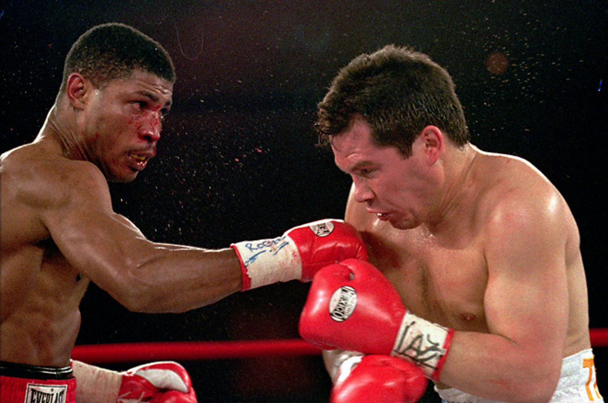 Tony Martin, left, lost to Julio Cesar Chavez in his final career fight. Martin was fatally shot on Friday.