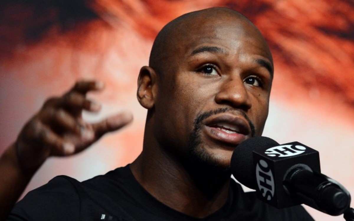 Floyd Mayweather Jr. may earn up to $100 million for his fight against Saul "Canelo" Alvarez. (Ethan Miller/Getty Images)