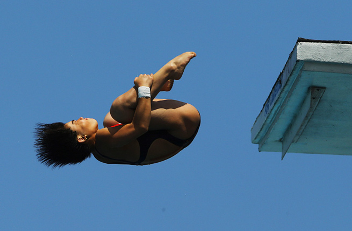 Huang Xiaohui of China dives during the Women's 10 Meter Platform Finals of the FINA USA Diving Grand Prix.