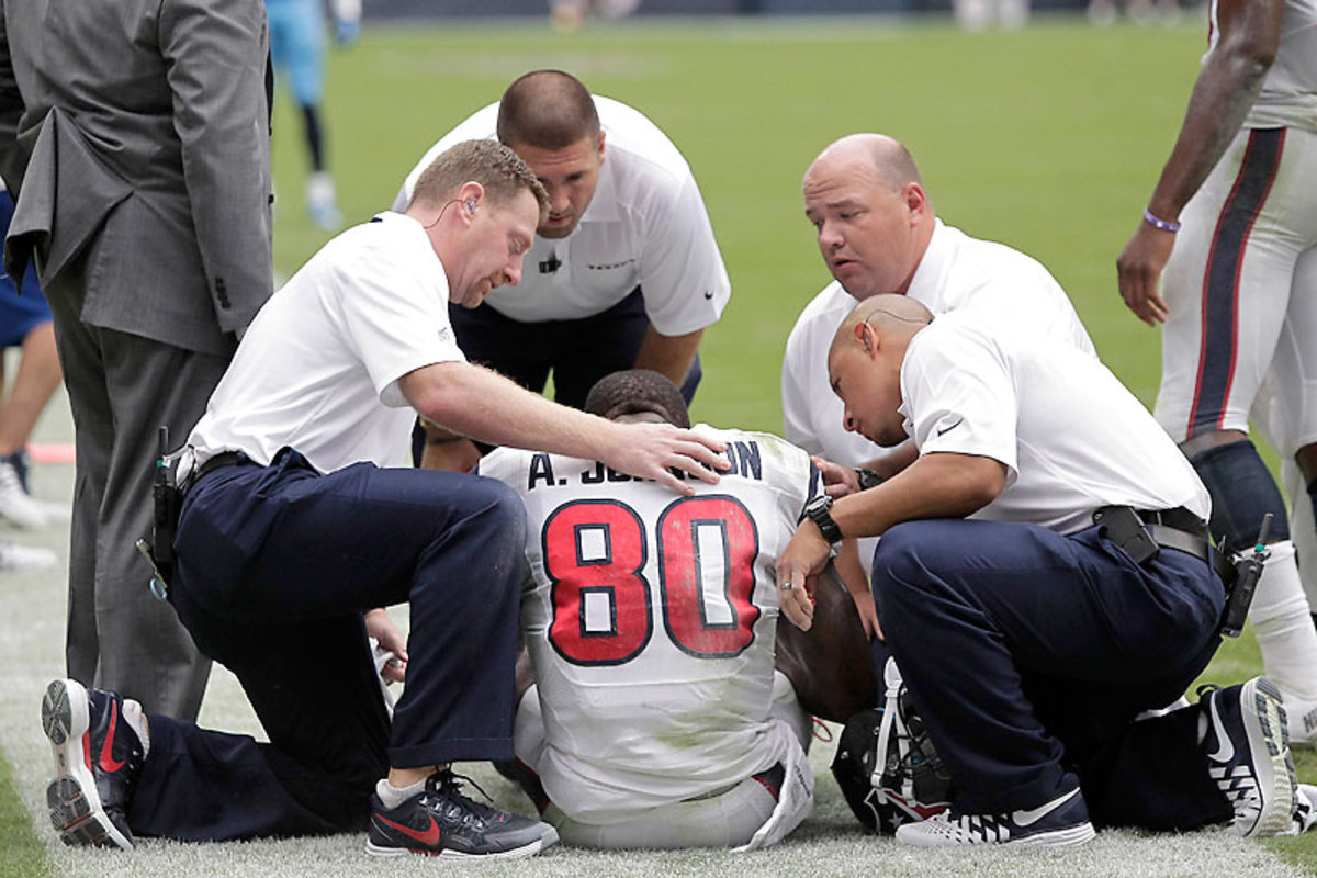In the future, team medical personnel will have a range of diagnostic tools on hand to evaluate a player after a head injury.  (Bob Levey/Getty Images) 