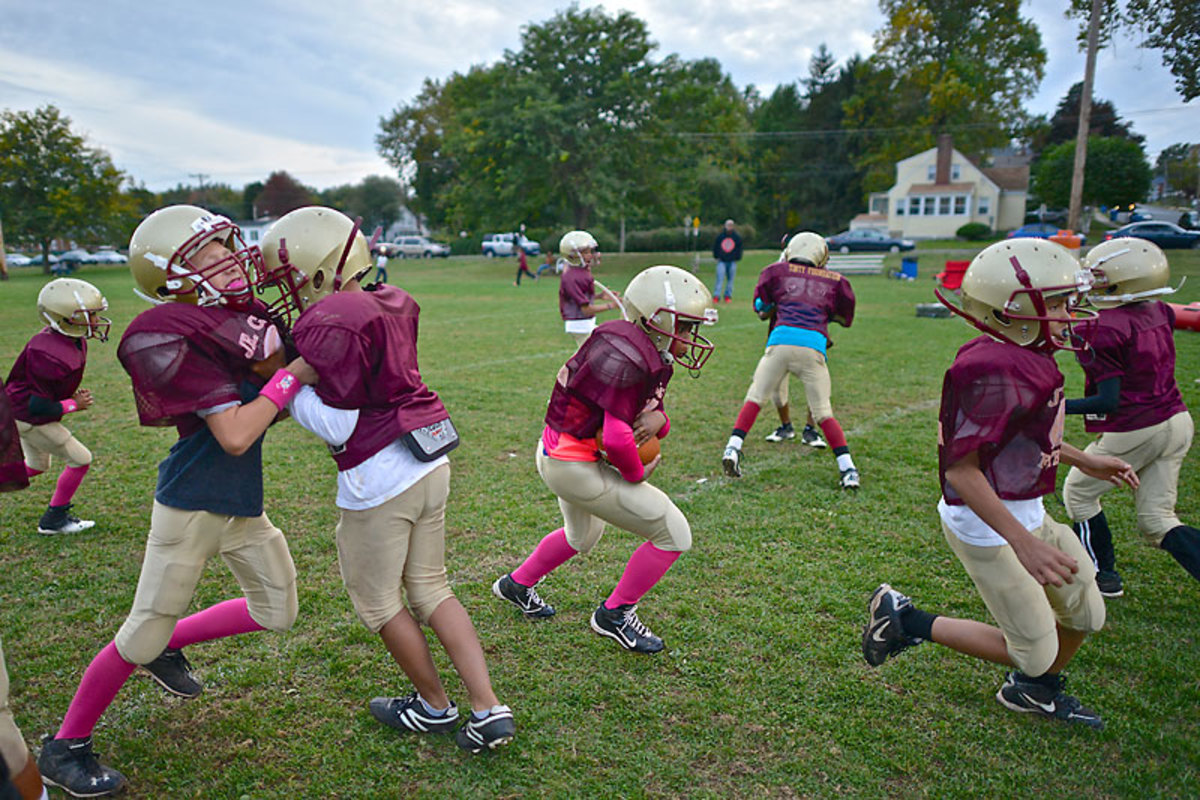 Kids in New Britain, Conn., practicing Heads Up football during a clinic in early October. (Kike Calvo/AP Images for National Football League)