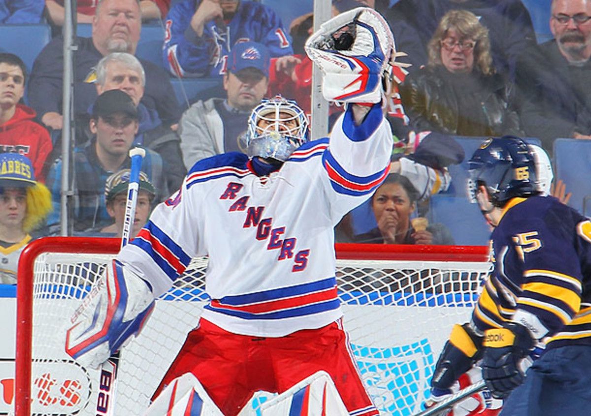 The Rangers have some ground to make up, but an easy schedule could send them to the playoffs. (Bill Wippert/ Getty Images)