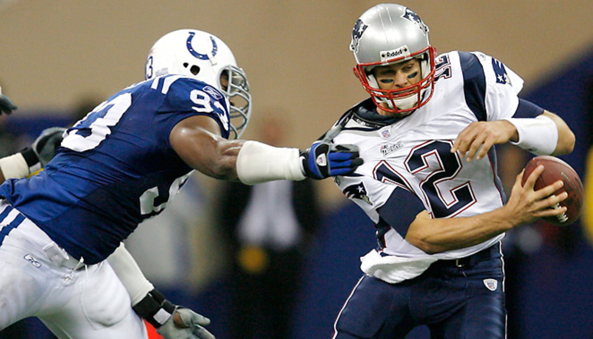 Dwight Freeney chased Tom Brady for years. Now Brady's extension could lead to them being teammates.