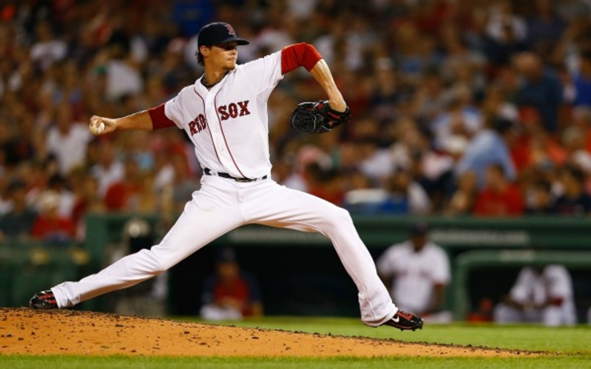 Red Sox right hander Clay Buccholz left Saturday's game early with the trainer. (Jared Wickerham/Getty Images)