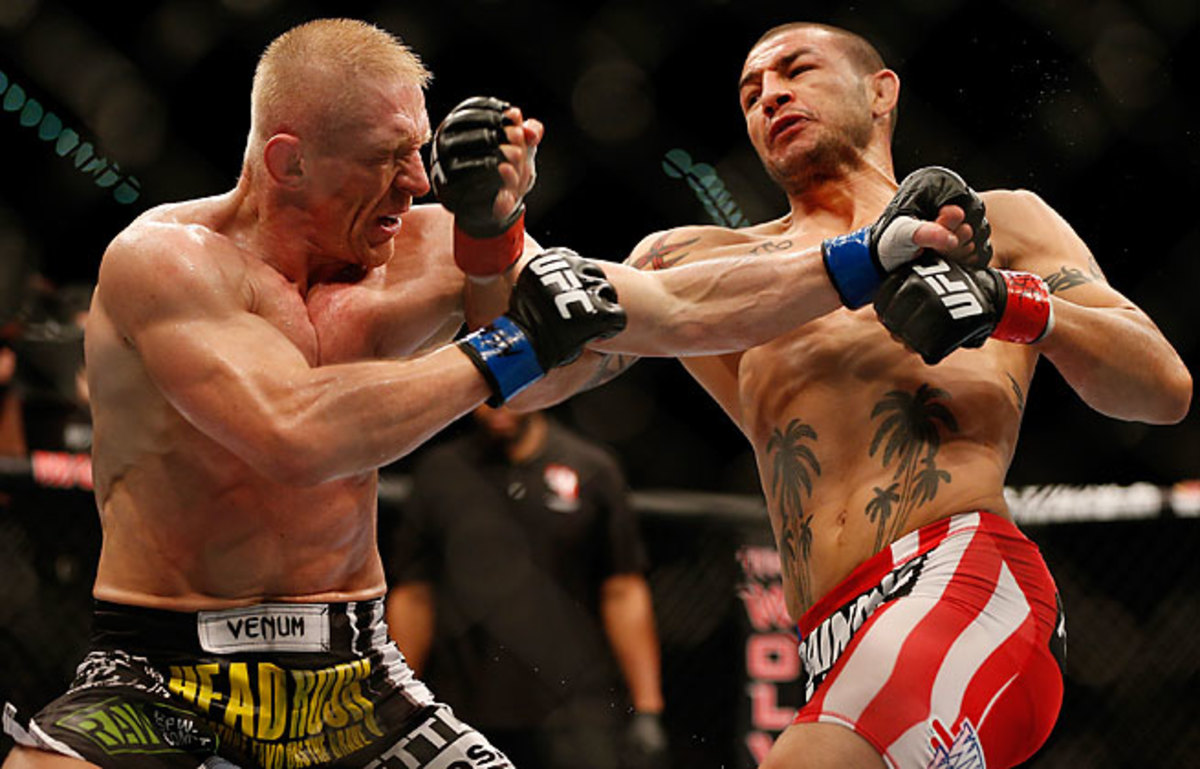 After a slow start, Cub Swanson (right) gained momentum to defeat Dennis Siver with a third-round TKO.