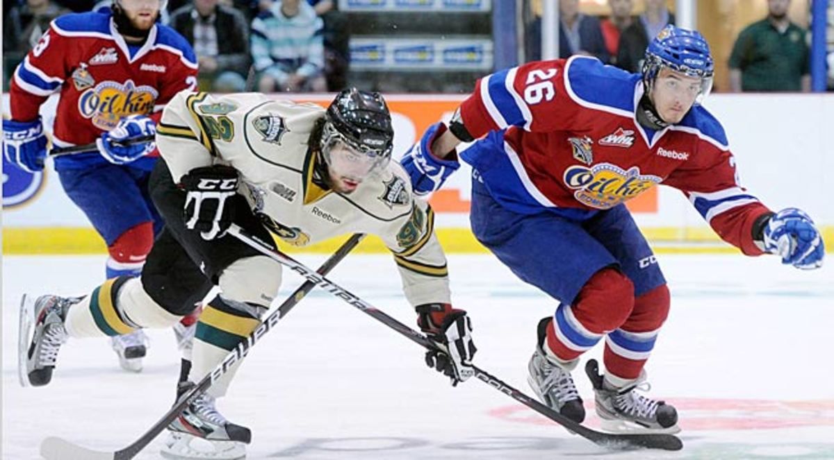 Winger Krisitans Peiss (right) was taken by the Oilers in the seventh round of the 2010 NHL Draft.