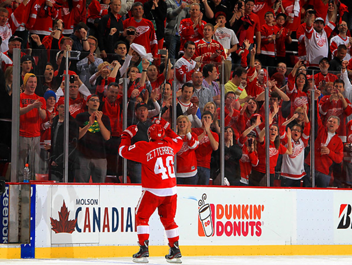 Henrik Zetterberg scored the game-winning goal for the Wings in overtime to force a Game 7. (Dave Reginek/Getty Images)