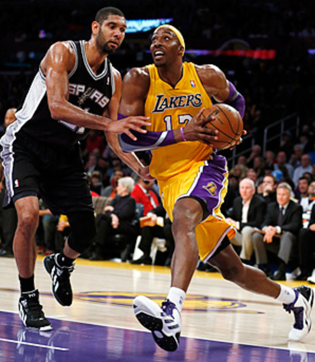 130418142931-tim-duncan-dwight-howard-single-image-cut.jpg