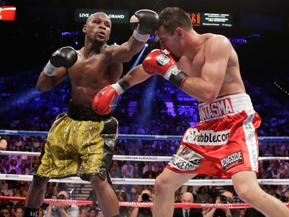 Mayweather vs Canelo results: 'Money' remains perfect (45-0) with decision  win despite questionable scorecard | MMA Mania, image size:1200x902