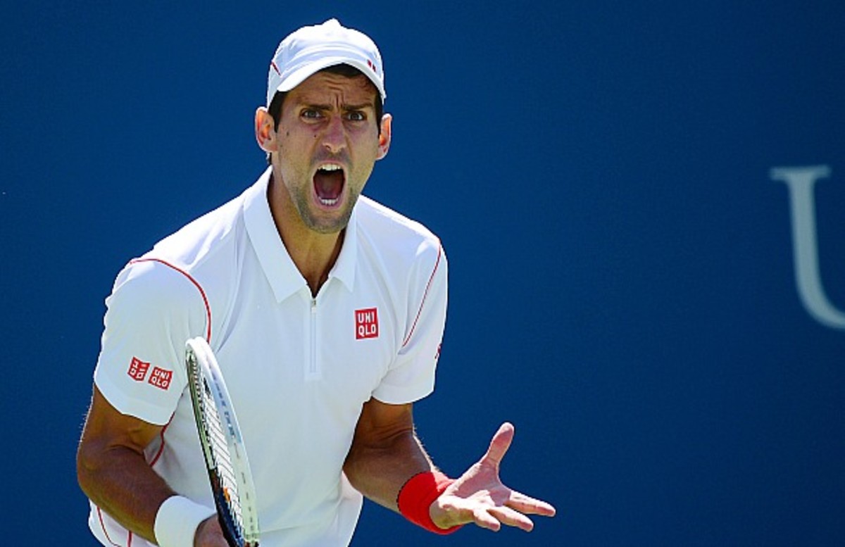 Djokovic lets out some frustration. (Emmanuel Dunand/AFP/Getty Images)