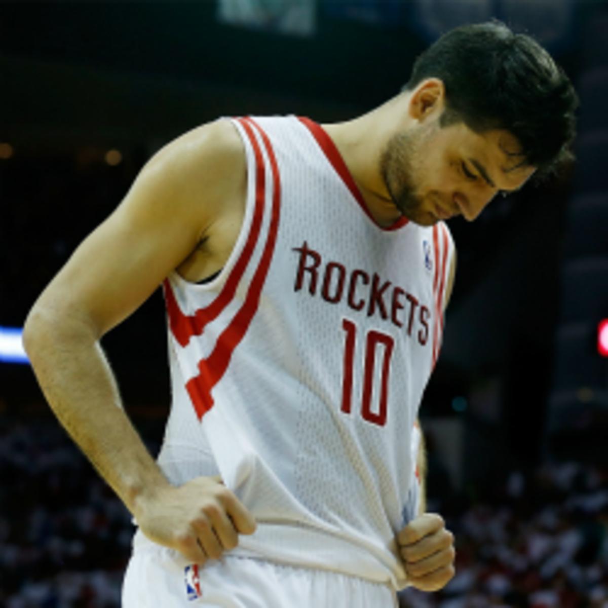 Rockets forward Carlos Delfino is out for the rest of the playoffs with a fractured foot (Scott Halleran/Getty Images)