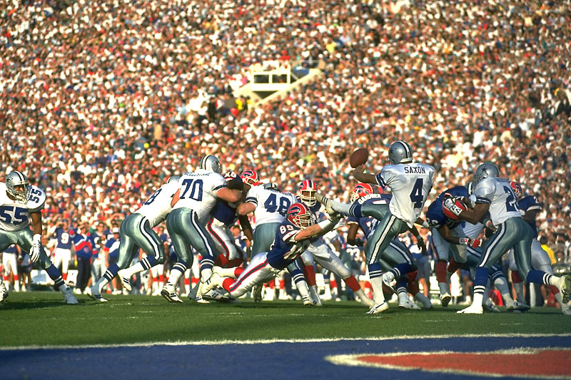 Steve Tasker—seen here blocking a punt that led to a touchdown in in Super Bowl XXVII—defined special teams, so much so that a Pro Bowl roster spot was created just for him. (John Biever/Sports Illustrated)