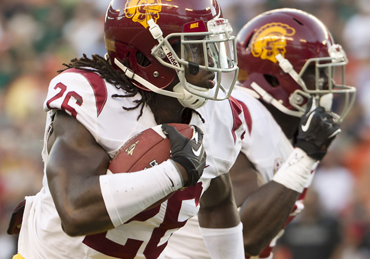 USC's Josh Shaw runs back one of the Trojans' four interceptions during its win over Hawaii.