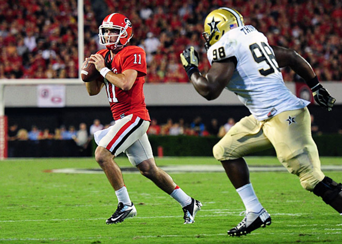 Quarterback Aaron Murray (11) has thrown for 10,091 yards and 95 TDs in his three-year Georgia career.