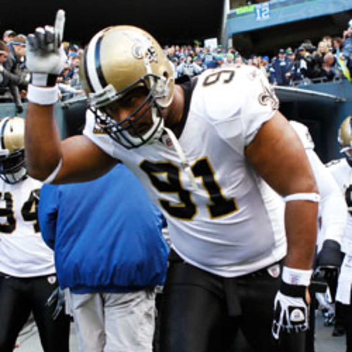 Will Smith (above) and Jonathan Vilma took pay cuts to stay with the Saints. (Jonathan Ferrey/Getty Images Sport)