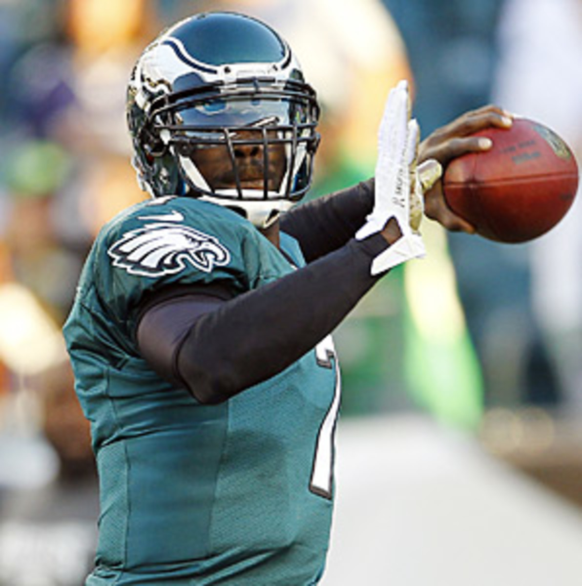 Limited to 10 games last season because of injuries, Michael Vick will return to the Eagles next season under new coach Chip Kelly.