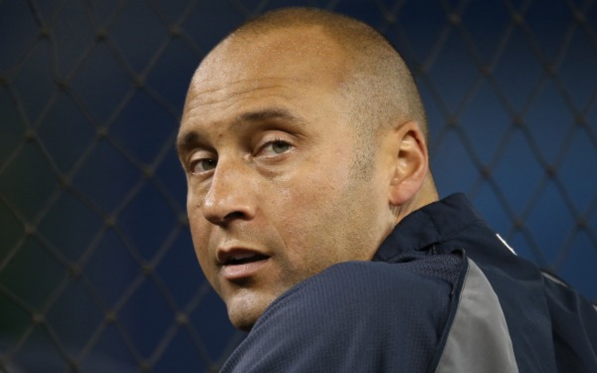 Derek Jeter exited Saturday's game early with ankle soreness. (Tom Szczerbowski/Getty Images)