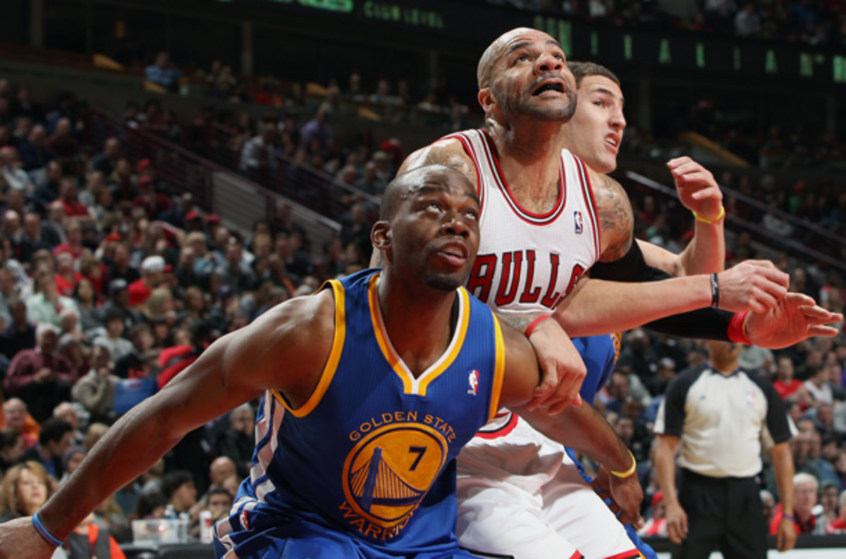 Carlos Boozer and the Bulls bullied the Warriors on Friday night. (Gary Dineen/Getty Images)