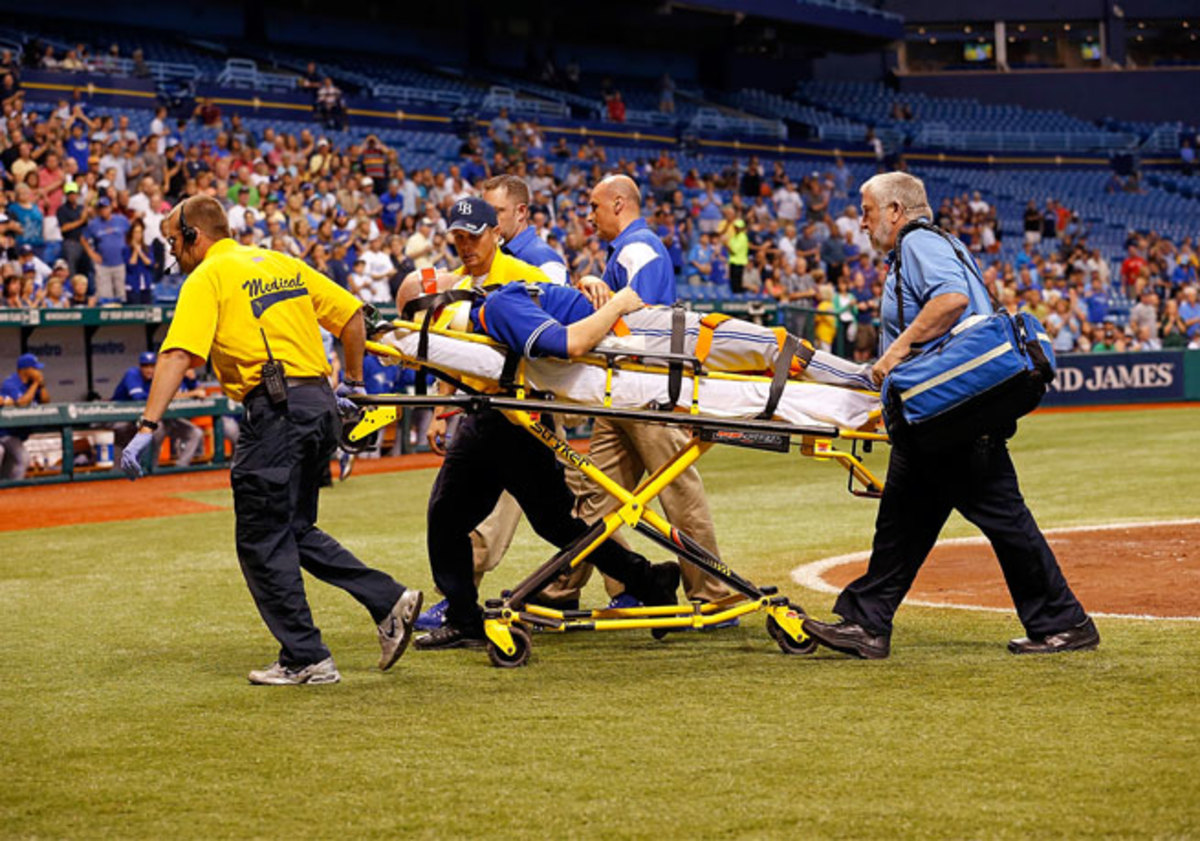 The Blue Jays said J.A. Happ was taken to Bayfront Medical Center, where he was alert and undergoing tests.