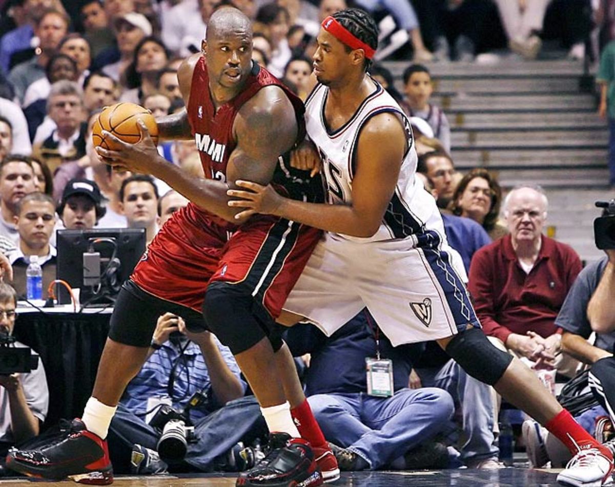 Jason Collins (right) has played tough defense against the likes of Shaquille O'Neal throughout his career.