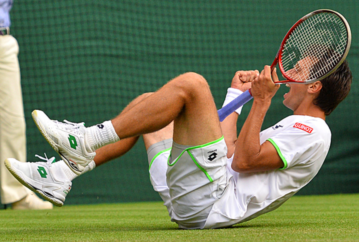 In arguably the biggest upset of the year, Sergiy Stakhovsky defeated Roger Federer in the second round at Wimbledon, ending Federer's streak of reaching 36 straight Grand Slam quarterfinals.