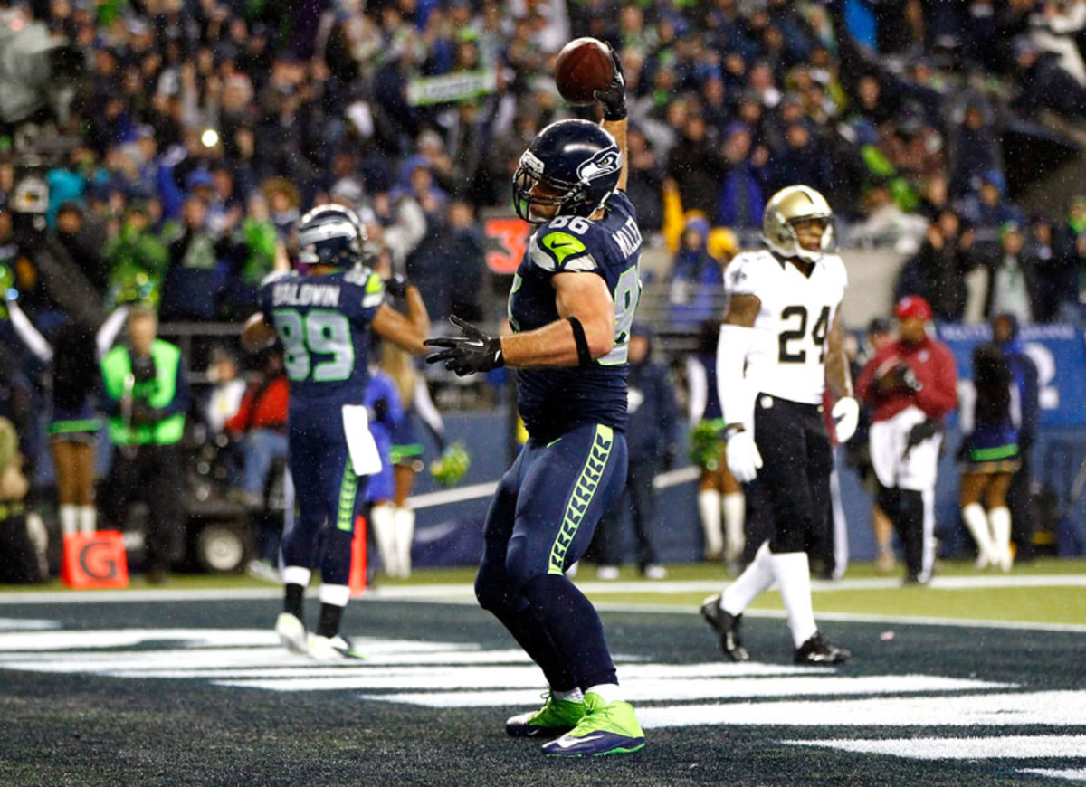 You can pretty much stick a spike in other team’s home-field hopes—the Seahawks have a two-game lead in the NFC with four to play—and their final two are in Seattle. (Jonathan Ferrey/Getty Images)