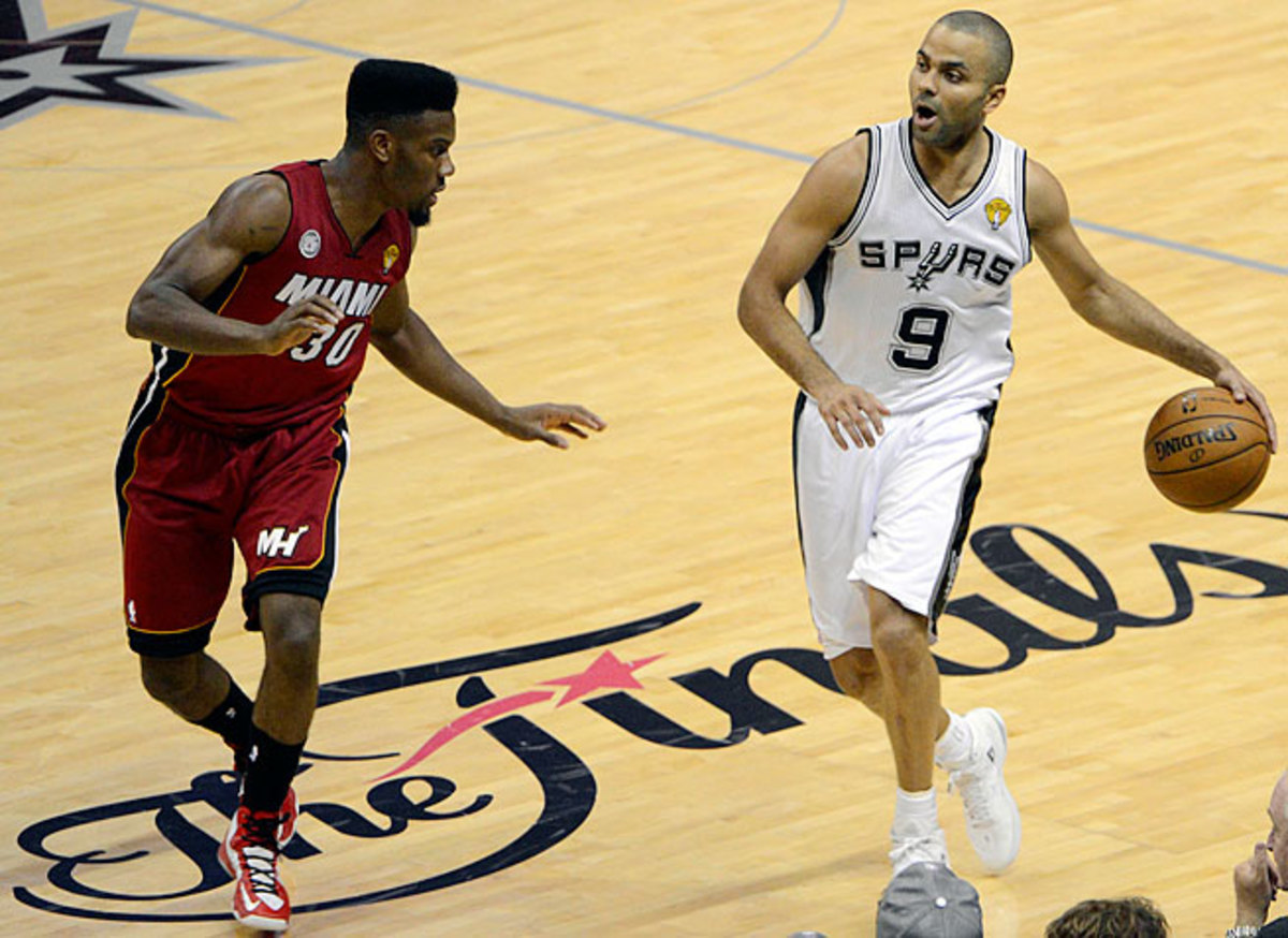 Tony Parker (right) injured his hamstring in the third quarter of San Antonio's Game 3 rout of Miami.
