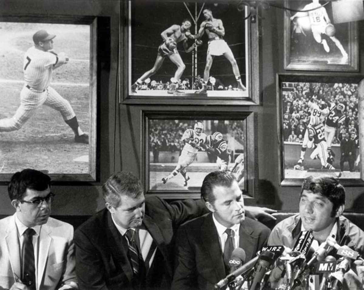 Pat Summerall (2nd from left), Frank Gifford (C) and Joe Namath 