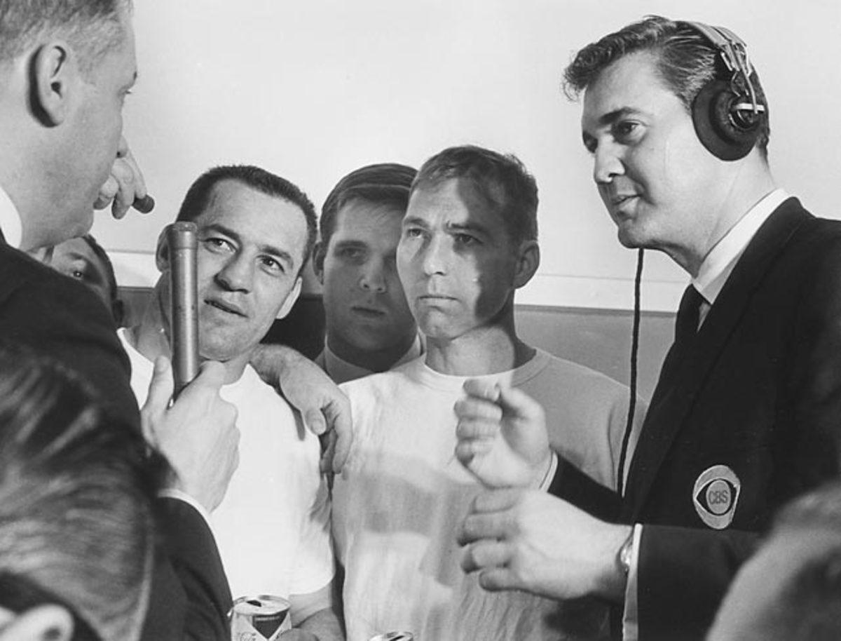 Pat Summerall (right) with Jim Taylor and Bart Starr