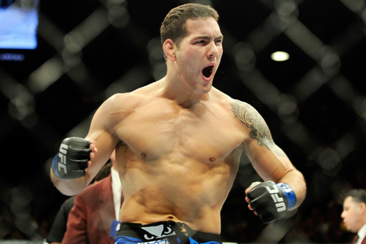 Chris Weidman celebrates after recording a TKO victory over Anderson Silva during UFC 162. (AP)