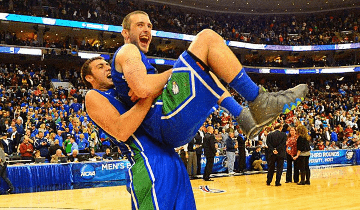 Chase Fieler (left), Brett Comer and Florida Gulf Coast engineered the tournament's biggest upset thus far. (SI)